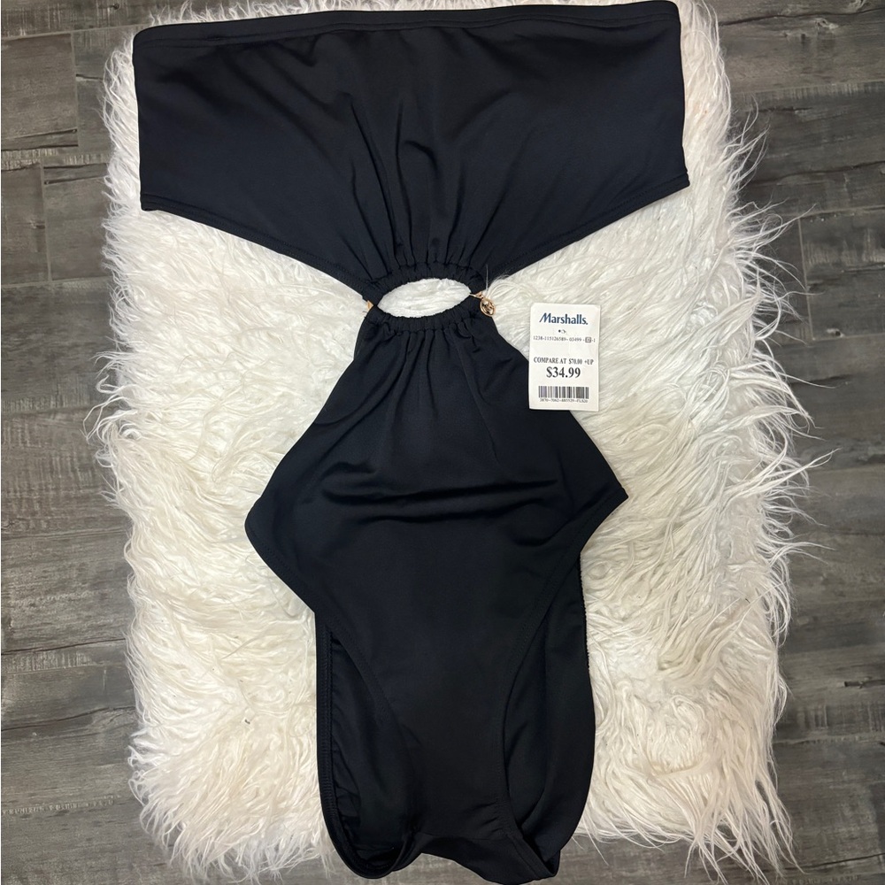 Brand new Michael Kors one piece swimsuit.